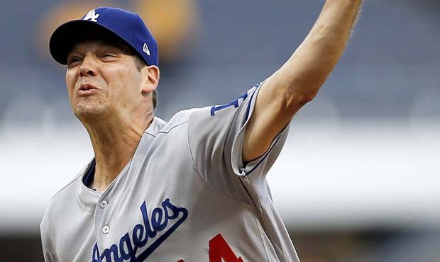 Los Angeles Dodgers starter Rich Hill pitches against the Pittsburgh Pirates in the first inning of...