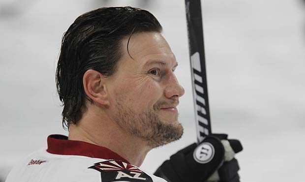 Arizona Coyotes forward Shane Doan (19) looks on prior to the first period of an NHL hockey game ag...