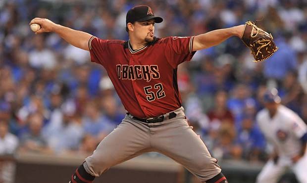 Arizona Diamondbacks starter Zack Godley delivers a pitch during the first inning of a baseball gam...