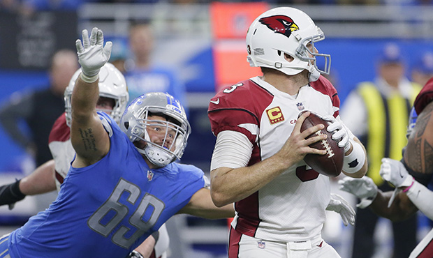 Detroit Lions defensive tackle Anthony Zettel (69) closes in to sack Arizona Cardinals quarterback ...
