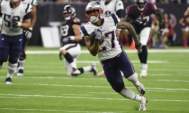 New England Patriots running back D.J. Foster (27) runs for a touchdown during the second half of a...