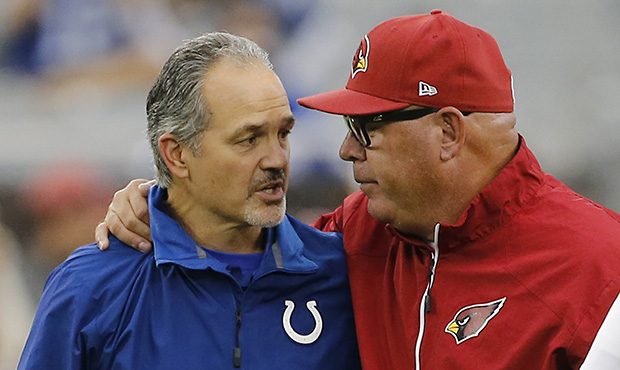 Arizona Cardinals head coach Bruce Arians, right, and Indianapolis Colts head coach Chuck Pagano st...