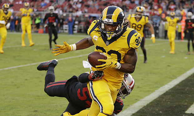 Los Angeles Rams running back Todd Gurley (30) scores a touchdown in front of San Francisco 49ers o...