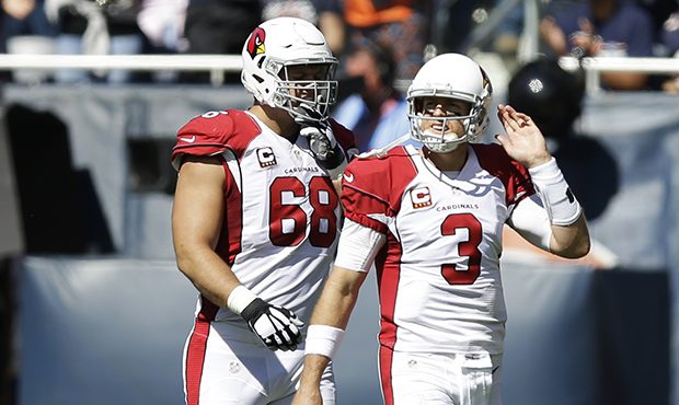 If Jared Veldheer (left) and Carson Palmer can step up their performance, the NFC West might be the...