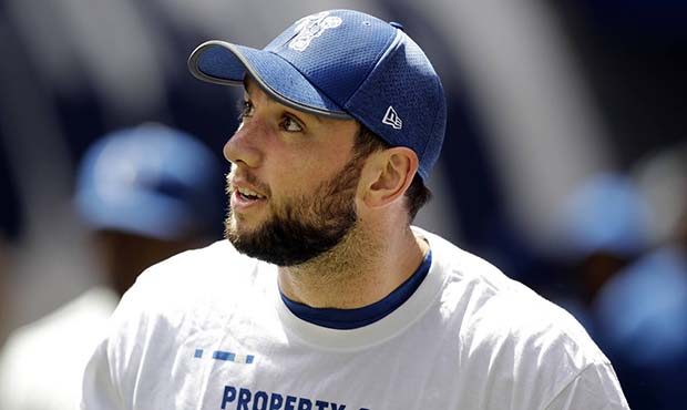 Injured Indianapolis Colts quarterback Andrew Luck watches from the sideline during the first half ...