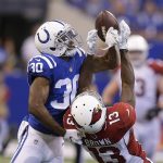 Indianapolis Colts' Rashaan Melvin (30) breaks up a pass intended for Arizona Cardinals' Jaron Brown (13) during the second half of an NFL football game Sunday, Sept. 17, 2017, in Indianapolis. (AP Photo/Michael Conroy)
