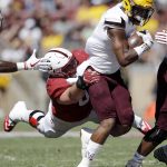 Arizona State wide receiver N'Keal Harry, right, is tackled by Stanford defensive tackle Harrison Phillips during the first half of an NCAA college football game Saturday, Sept. 30, 2017, in Stanford, Calif. (AP Photo/Marcio Jose Sanchez)
