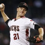 Arizona Diamondbacks' Zack Greinke throws a pitch against the Colorado Rockies during the first inning of a baseball game, Monday, Sept. 11, 2017, in Phoenix. (AP Photo/Ross D. Franklin)