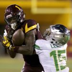 Arizona State wide receiver N'Keal Harry (1) makes the catch over Oregon cornerback Deommodore Lenoir during the first half during an NCAA college football game, Saturday, Sept. 23, 2017, in Tempe, Ariz. (AP Photo/Rick Scuteri)