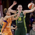 Phoenix Mercury guard Leilani Mitchell (5) passes the ball as Seattle Storm forward Breanna Stewart (30) defends during the first half of a first-round WNBA playoff basketball game, Wednesday, Sept. 6, 2017, in Tempe, Ariz. (AP Photo/Matt York)