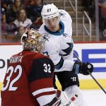 San Jose Sharks' Joonas Donskoi (27) tries to redirect the puck past Arizona Coyotes' Antti Raanta (32) during the first period of a preseason NHL hockey game Saturday, Sept. 23, 2017, in Glendale, Ariz. (AP Photo/Ross D. Franklin)
