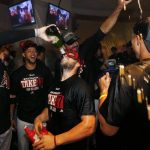Arizona Diamondbacks celebrate clinching a National League Wild Card playoff spot after a baseball game against the Miami Marlins, Sunday, Sept. 24, 2017, in Phoenix. The Diamondbacks defeated the Marlins 3-2. (AP Photo/Ross D. Franklin)