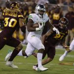 Oregon running back Royce Freeman (21) carries for a first down against Arizona State during the first half during an NCAA college football game, Saturday, Sept. 23, 2017, in Tempe, Ariz. (AP Photo/Rick Scuteri)
