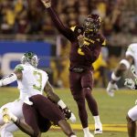 Arizona State quarterback Manny Wilkins (5) throws a pass against Oregon during the first half during an NCAA college football game, Saturday, Sept. 23, 2017, in Tempe, Ariz. (AP Photo/Rick Scuteri)