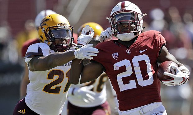 Stanford running back Bryce Love (20) runs for a touchdown past Arizona State defensive back Chad A...