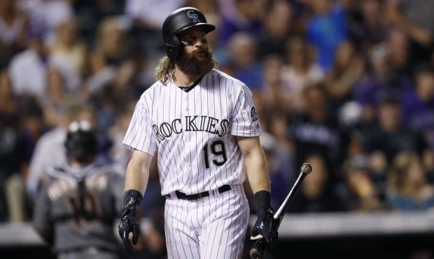 Colorado Rockies' Charlie Blackmon heads back to the dugout after striking out with two runners on ...