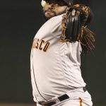 
              San Francisco Giants' Johnny Cueto delivers a pitch to the Arizona Diamondbacks during the first inning of a baseball game, Monday, Sept. 25, 2017 in Phoenix. (AP Photo/Darryl Webb)
            