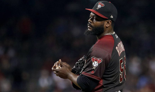 Arizona Diamondbacks relief pitcher Fernando Rodney stands on the mound after giving up the lead du...