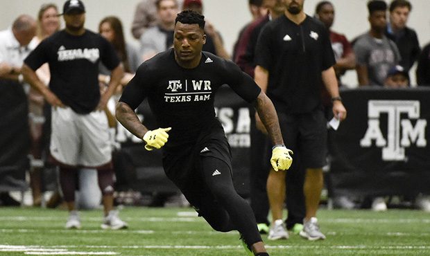 Former Texas A&M wide receiver Ricky Seals-Jones runs a drill during Texas A&M NFL Pro Day ...