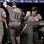 Arizona Diamondbacks' A.J. Pollock celebrates going into the dugout after hitting a solo home run during the sixth inning of a baseball game against the Kansas City Royals, Saturday, Sept. 30, 2017, in Kansas City, Mo. (AP Photo/Charlie Riedel)