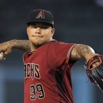 Arizona Diamondbacks starting pitcher Taijuan Walker winds up during the first inning of a baseball game against the Los Angeles Dodgers, Wednesday, Sept. 6, 2017, in Los Angeles. (AP Photo/Mark J. Terrill)