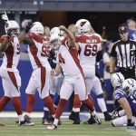 Arizona Cardinals' Phil Dawson (4) celebrates after kicking a game winning 30-yard field in overtime of an NFL football game against the Indianapolis Colts, Sunday, Sept. 17, 2017, in Indianapolis. (AP Photo/Darron Cummings)