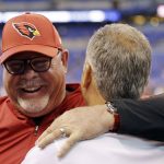 Arizona Cardinals head coach Bruce Arians, left, talks with Indianapolis Colts head coach Chuck Pagano before an NFL football game Sunday, Sept. 17, 2017, in Indianapolis. (AP Photo/AJ Mast)