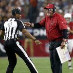 Arizona Cardinals head coach Bruce Arians looks for a call from line judge Julian Mapp (10) during the first half of an NFL football game against the Dallas Cowboys, Monday, Sept. 25, 2017, in Glendale, Ariz. (AP Photo/Ross D. Franklin)