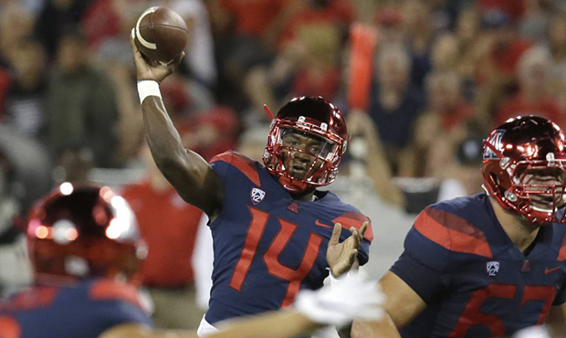 Arizona quarterback Khalil Tate (14) throws against Houston during the second half of an NCAA colle...