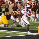 Texas Tech's Cameron Batson scores a first-half touchdown while chased by Arizona State's Dasmond Tautalatasi during the first half of an NCAA college football game Saturday, Sept. 16, 2017, in Lubbock, Texas. (Mark Rogers/Lubbock Avalanche-Journal via AP)