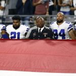 The Dallas Cowboys stand during the national anthem prior to an NFL football game against the Arizona Cardinals, Monday, Sept. 25, 2017, in Glendale, Ariz. (AP Photo/Ross D. Franklin)