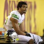 Oregon linebacker Troy Dye sits in the bench area after Arizona State defeated Oregon 37-35 during an NCAA college football game, Saturday, Sept. 23, 2017, in Tempe, Ariz. (AP Photo/Rick Scuteri)