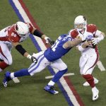 Arizona Cardinals quarterback Carson Palmer (3) is sacked by Indianapolis Colts' John Simon (51) during the first half of an NFL football game Sunday, Sept. 17, 2017, in Indianapolis. (AP Photo/AJ Mast)