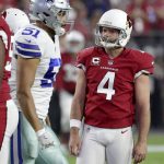 Arizona Cardinals kicker Phil Dawson (4) looks way after missing a field goal as Dallas Cowboys outside linebacker Kyle Wilber (51) heads to the bench during the first half of an NFL football game, Monday, Sept. 25, 2017, in Glendale, Ariz. (AP Photo/Rick Scuteri)