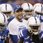 Indianapolis Colts quarterback Andrew Luck smiles as he runs off the field with his teammates before an NFL football game against the Arizona Cardinals, Sunday, Sept. 17, 2017, in Indianapolis. (AP Photo/AJ Mast)