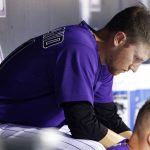 Colorado Rockies starting pitcher Kyle Freeland sits in the dugout after being pulled in the fourth inning of a baseball game against the Arizona Diamondbacks, Friday, Sept. 1, 2017, in Denver. (AP Photo/Jack Dempsey)