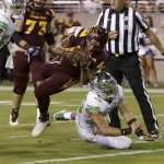 Arizona State running back Demario Richard (4) scores a touchdown over Oregon linebacker Troy Dye during the second half of an NCAA college football game, Saturday, Sept. 23, 2017, in Tempe, Ariz. (AP Photo/Rick Scuteri)
