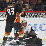 Anaheim Ducks center Kalle Kossila, left, shoots past Arizona Coyotes goalie Louis Domingue during the first period of a preseason hockey game, Wednesday, Sept. 20, 2017, in Anaheim, Calif. The goal was never called by officials and there is no replay during preseason. (AP Photo/Mark J. Terrill)