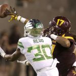 Arizona State defensive back J'Marcus Rhodes (17) gets a hand on the pass intended for Oregon wide receiver Alfonso Cobb during the second half during an NCAA college football game, Saturday, Sept. 23, 2017, in Tempe, Ariz. (AP Photo/Rick Scuteri)