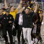 Arizona State coach Todd Graham raises his arms after Arizona State defeated Oregon 37-35 during an NCAA college football game, Saturday, Sept. 23, 2017, in Tempe, Ariz. (AP Photo/Rick Scuteri)
