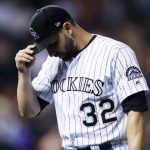 Colorado Rockies relief pitcher Tyler Chatwood heads to the dugout after giving up two runs to the Arizona Diamondbacks during the eighth inning of a baseball game Saturday, Sept. 2, 2017, in Denver. The Diamondbacks won 6-2. (AP Photo/David Zalubowski)