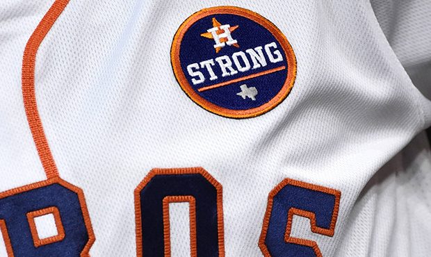 A "Houston Strong" patch is worn on the jersey of Houston Astros' Carlos Correa before the first ga...