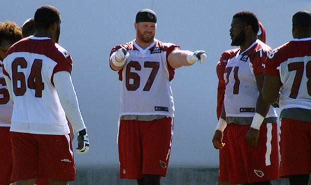 Lineman Tony Bergstrom and his teammates during an OTA practice May 24. (Photo by Adam Green/Arizon...