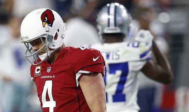 Arizona Cardinals kicker Phil Dawson (4) walks to the bench after missing a field goal against the ...