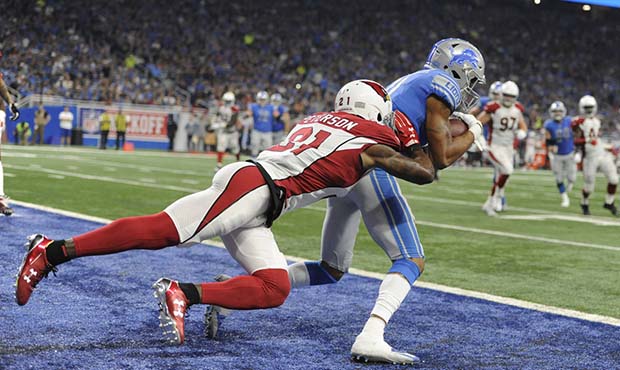 Detroit Lions wide receiver Marvin Jones (11) catches a 6-yard touchdown as Arizona Cardinals corne...