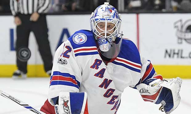 New York Rangers goalie Antti Raanta, of Finland, deflects a shot during the second period of the t...