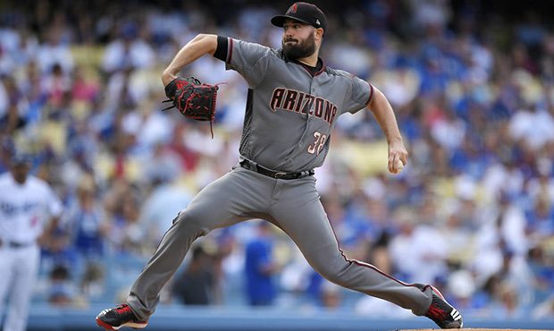 Arizona Diamondbacks starting pitcher Robbie Ray throws to the plate during the first inning of a b...