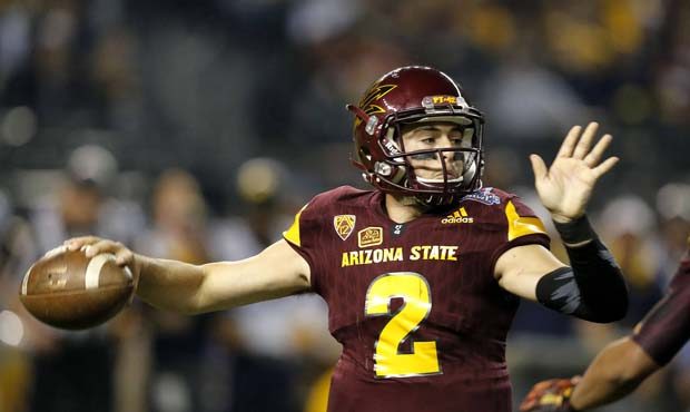 Arizona State quarterback Mike Bercovici (2) looks to pass against West Virginia during the first h...