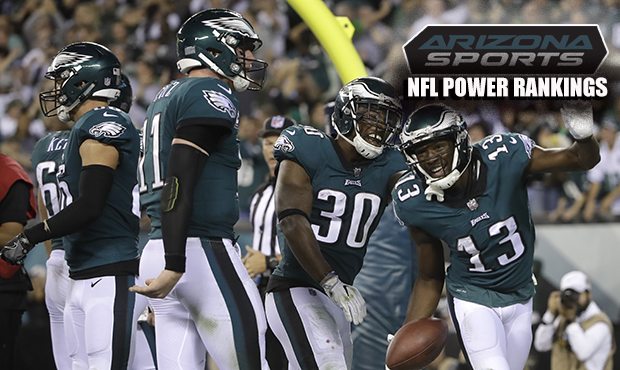 Philadelphia Eagles wide receiver Nelson Agholor (13) celebrates with teammates, after catching a t...