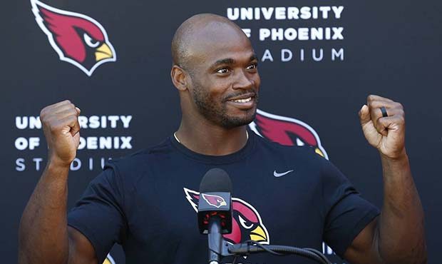 New Arizona Cardinals running back Adrian Peterson answers a question about being traded to the Car...